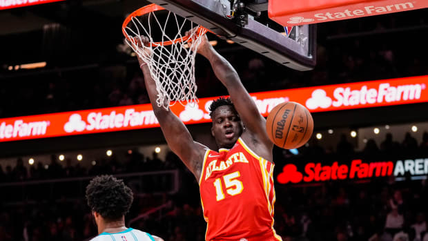 Clint Capela dunks the ball.